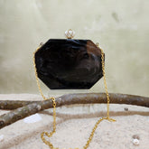 The Meena mosaic clutch